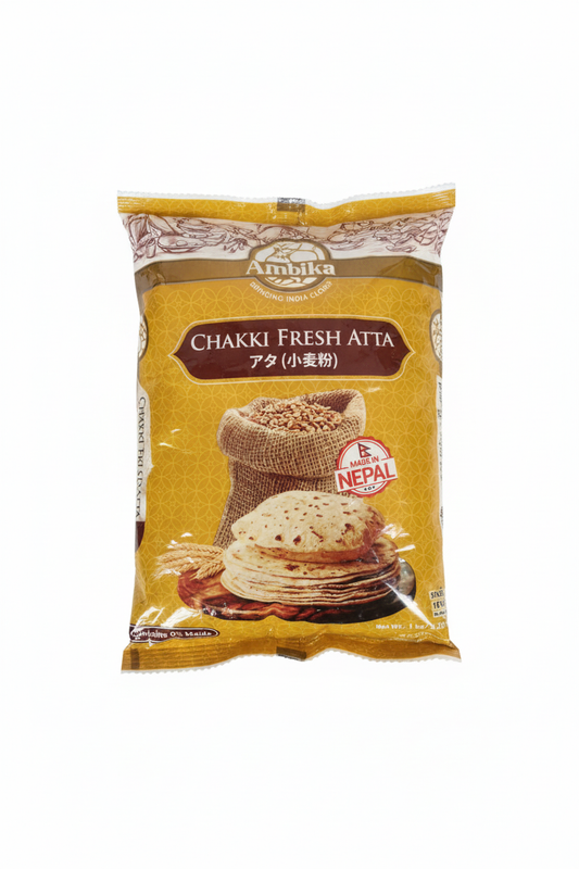 Ambika Chakki Fresh Atta wheat flour with white background